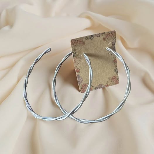 LARGE SILVER TWISTED HOOPS