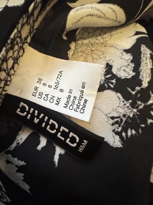 BLACK/WHITE SHORT ROMPER SIZE  8