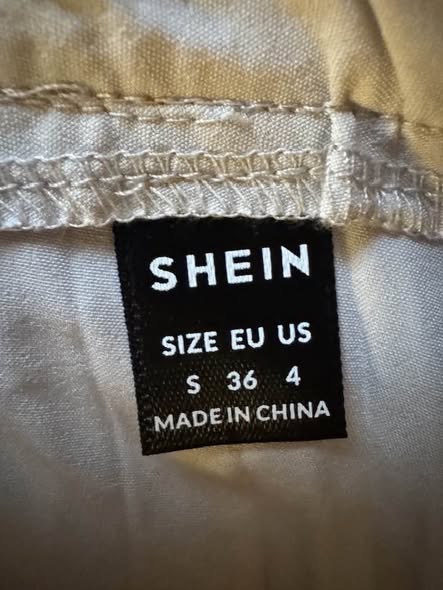 ASYMMETRICAL PLEADED SKIRT SIZE S